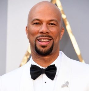 Common wearing Fred Leighton brooch and cufflinks and stud sets at the Oscars