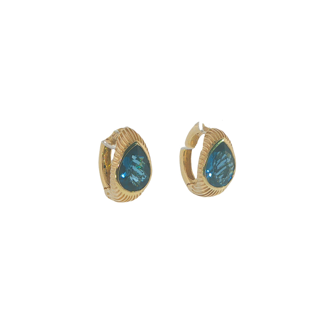Ripple Effect Huggies With Pear Cut Blue Topaz