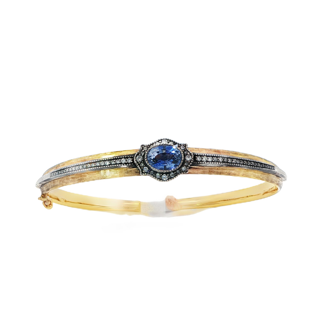 Gold And Oxidized Silver Le Fleur Bracelet With An Oval Blue Sapphire Center Stone