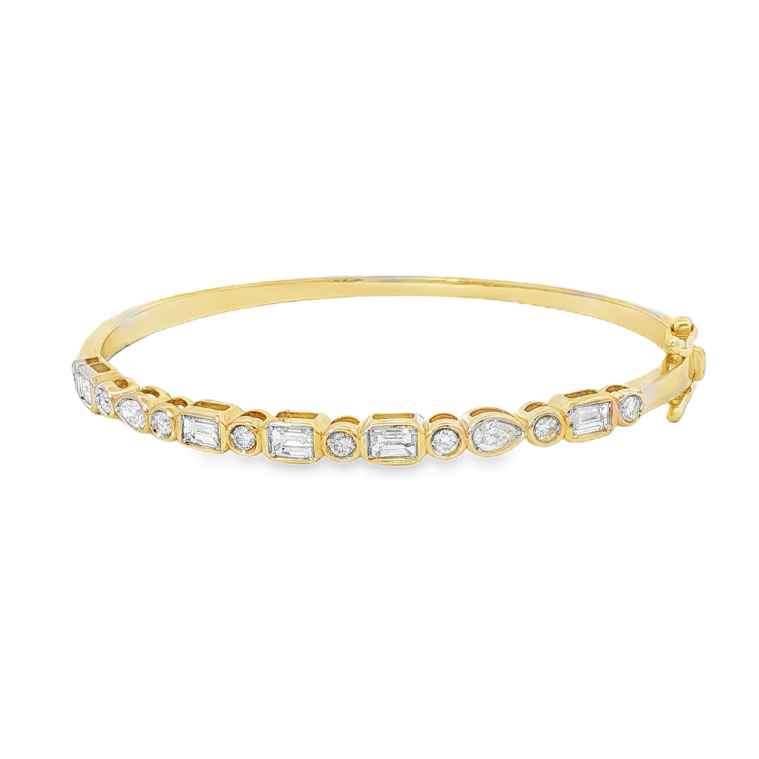 Gold Bangle Featuring Baguette, Round, and Pear Diamonds