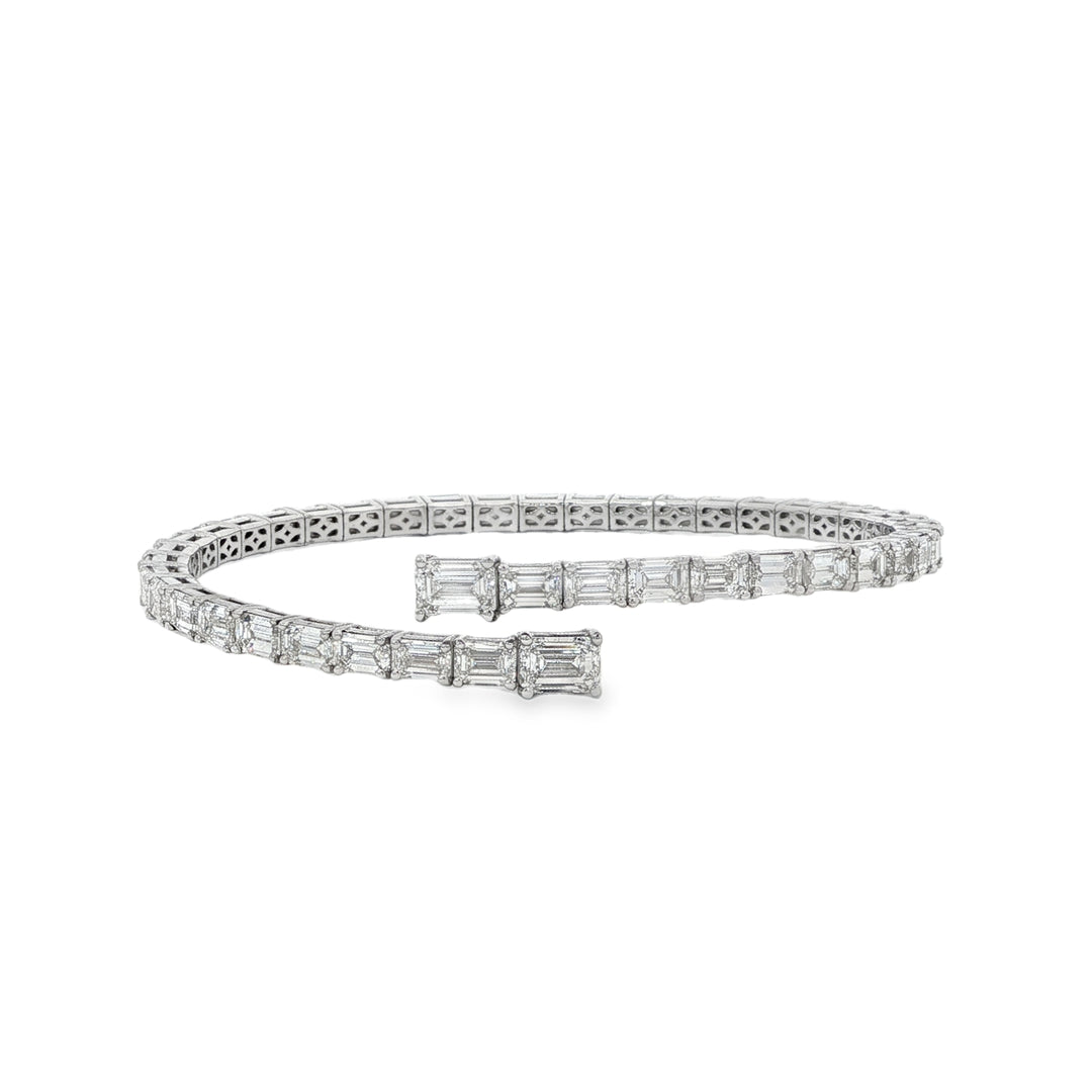 White Gold Flexible Bypass Bracelet With Emerald Cut Diamonds