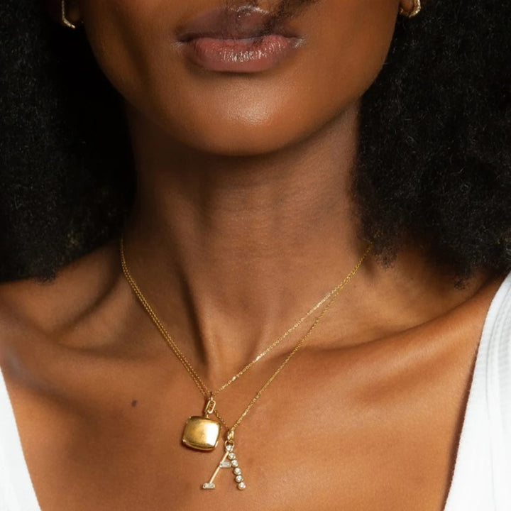 "A" Initial Charm With Round And Baguette Diamonds On A 17" Chain