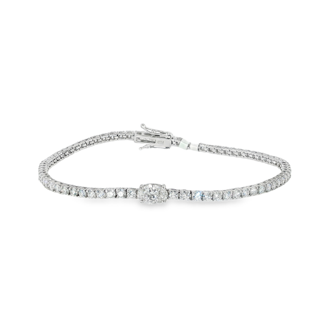 18K White Gold Diamond Tennis Bracelet With An Oval Cut Center Diamond - 7"