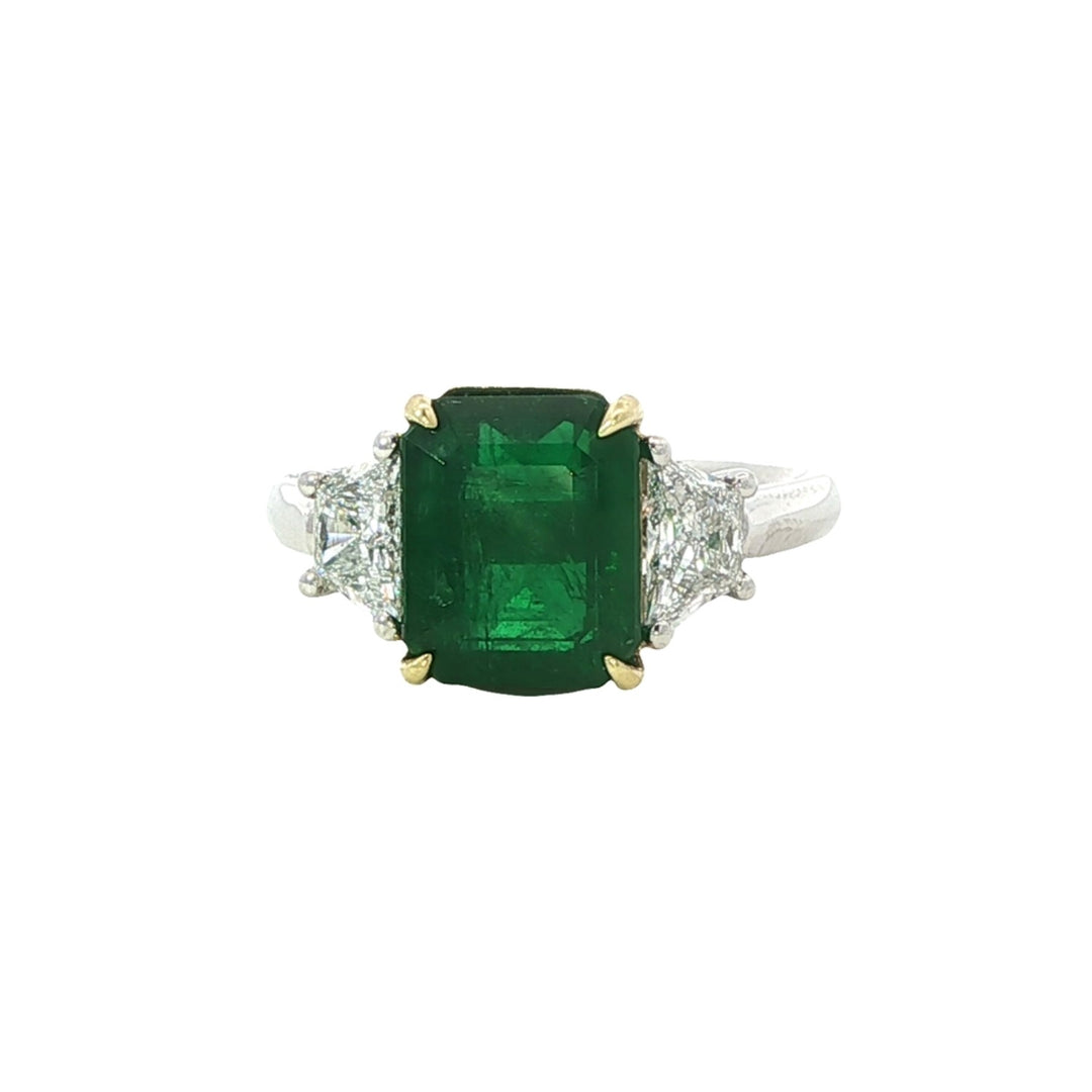 Platinum Ring With Emerald Center Stone and Trillion Cut Diamonds On Either Side - Size 6.25