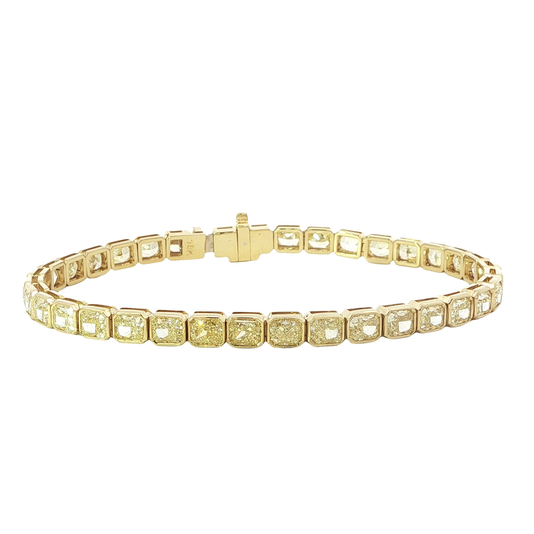 18K Yellow Gold Bezel Set Radiant Cut Yellow Diamond Tennis Bracelet Weighing 12.13cts