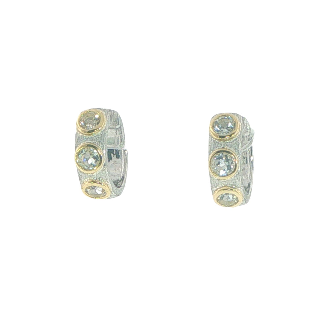 Sterling Silver Huggies With Bezel Set White Topaz
