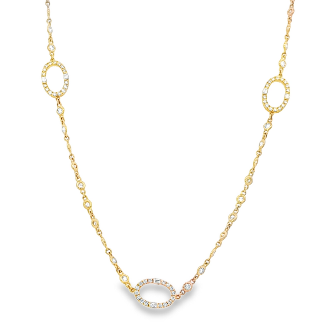 Yellow Gold Diamond By The Yard Necklace Featuring Oval Stations With Round and Baguette Diamond Accents
