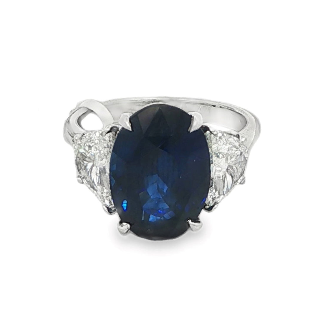 Platinum Ring With Oval Blue Sapphire Center Stone and Half Moon Diamonds On Eiither Side - Size 6