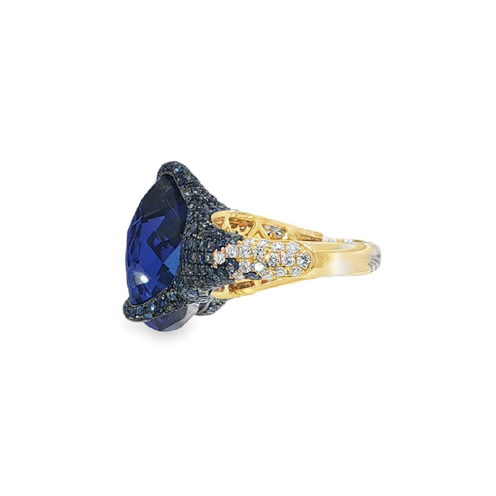Pear Shaped Tanzanite Ring In A Confetti Setting Of Blue Sapphires and Diamonds - Size 7