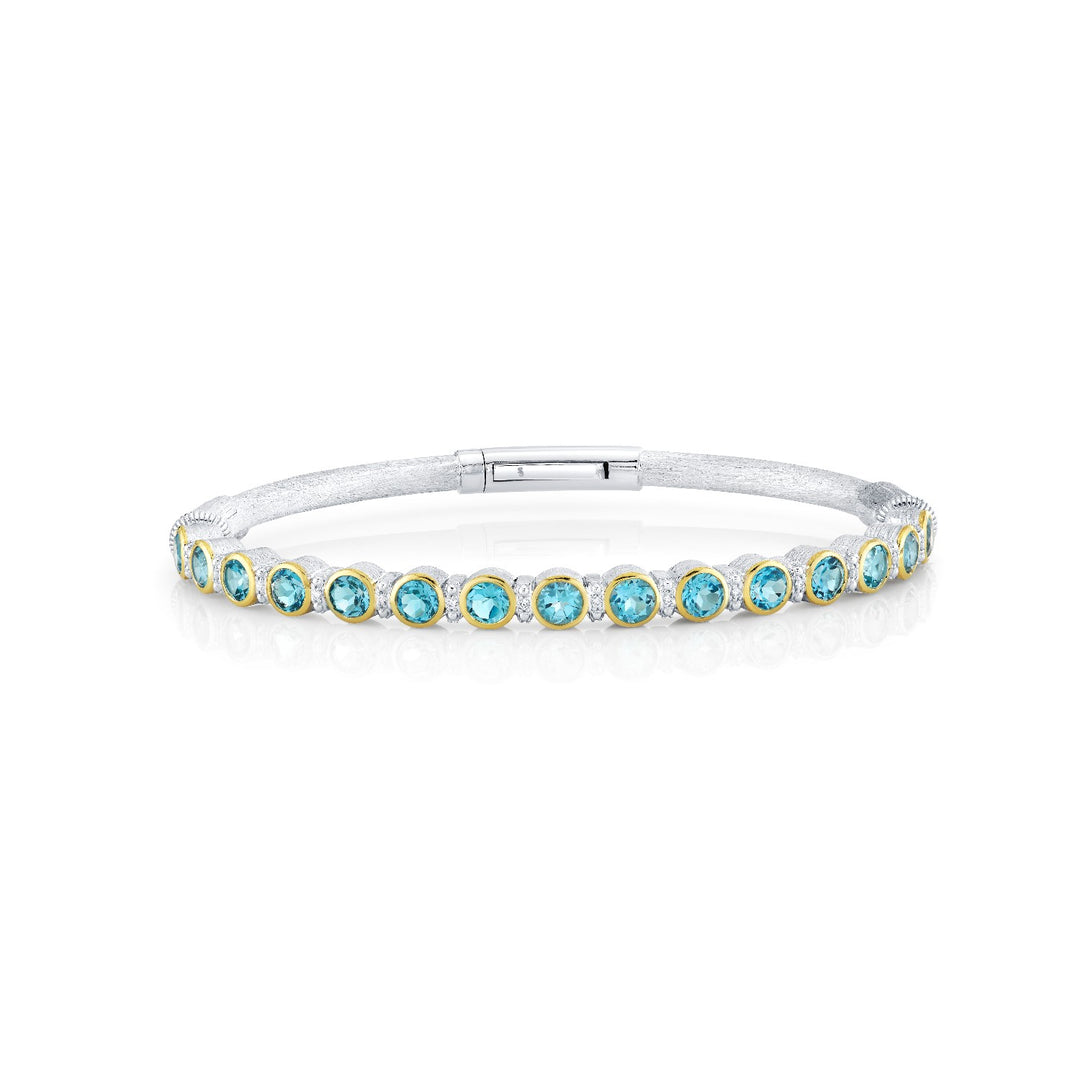 Sterling Silver Bracelet With Swiss Blue Topaz In Yellow Gold Bezel