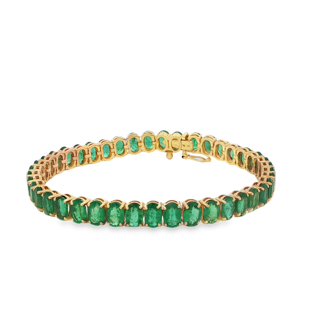 Yellow Gold and Oval Cut Emerald Tennis Bracelet